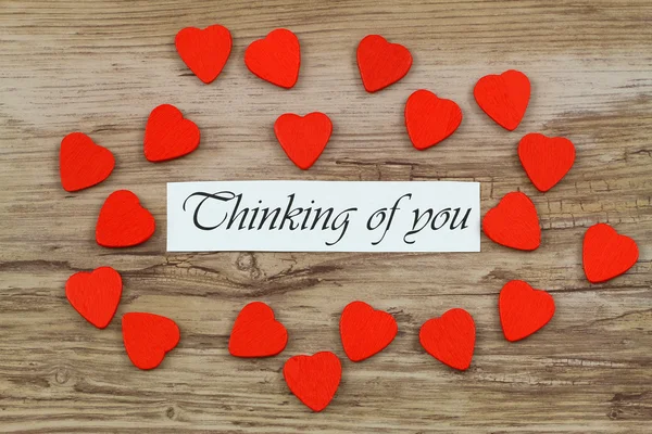 Thinking of you card with little red wooden hearts — Stock Photo, Image