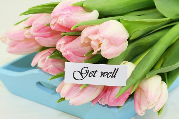 Přání brzkého uzdravení s růžové tulipány — Stock fotografie