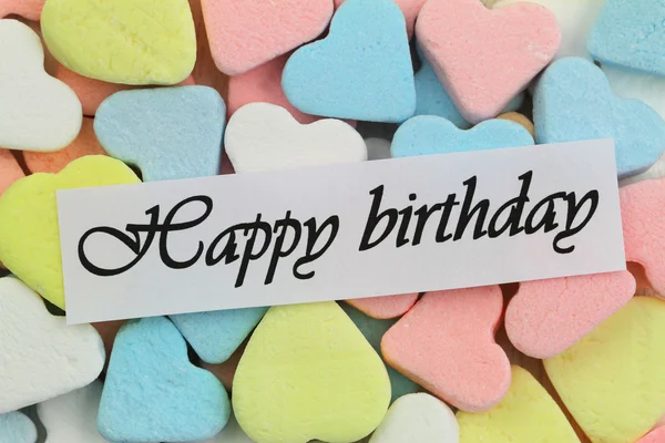 Happy Birthday card with colorful candy hearts — Stock Photo, Image