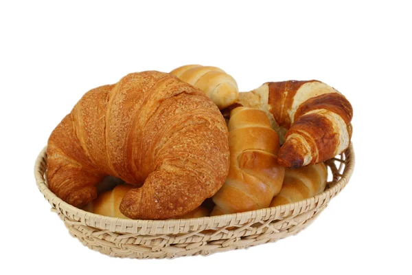 Butter croissants in bread basket, isolated on white — Stock Photo, Image