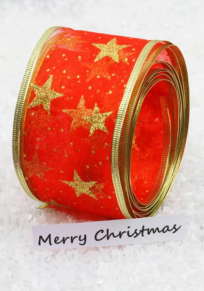 Merry Christmas card met rood lint, gouden sterren — Stockfoto