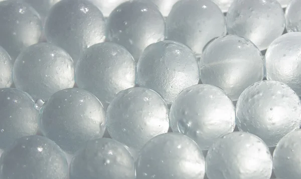 Fundo suave gelo frio brilhante pequenas bolas — Fotografia de Stock