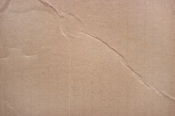 Fondo de papel beige áspero de cartón arrugado —  Fotos de Stock