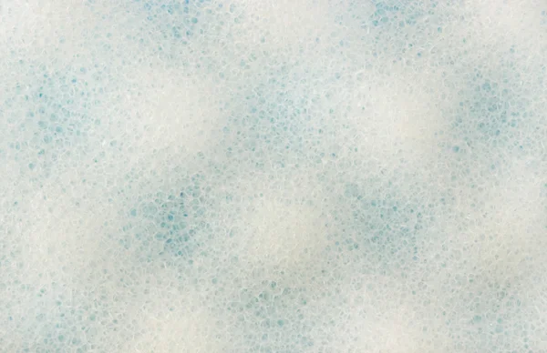 Абстрактний фон біло-синій пористий м'який пінополіуретан — стокове фото
