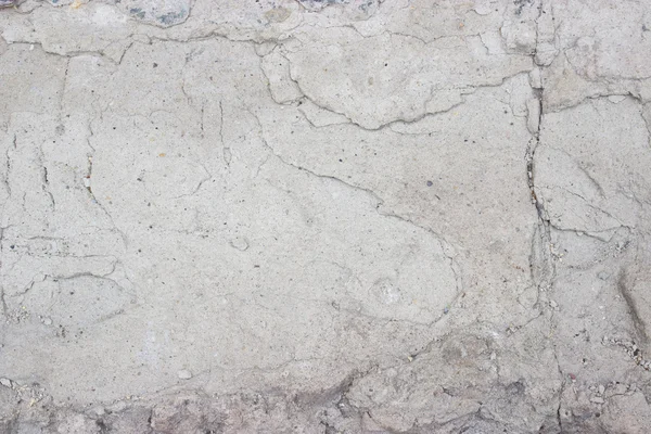 Kaba taş arka plan eski çimento duvar çatlaklar
