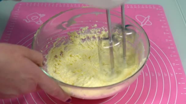 Whipping cream with a mixer close-up. Making Valentines Day Cookie Dough — Stock Video