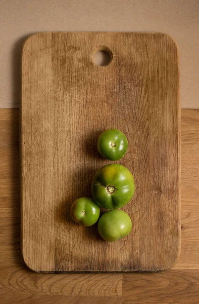 Zelená rajčata, podzimní zelenina — Stock fotografie