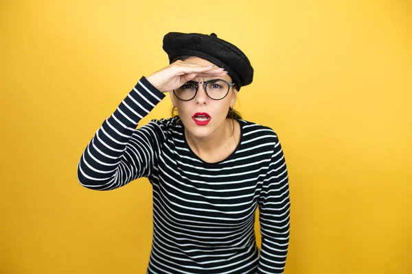 Young Beautiful Brunette Woman Wearing French Beret Glasses Yellow Background Stock Image