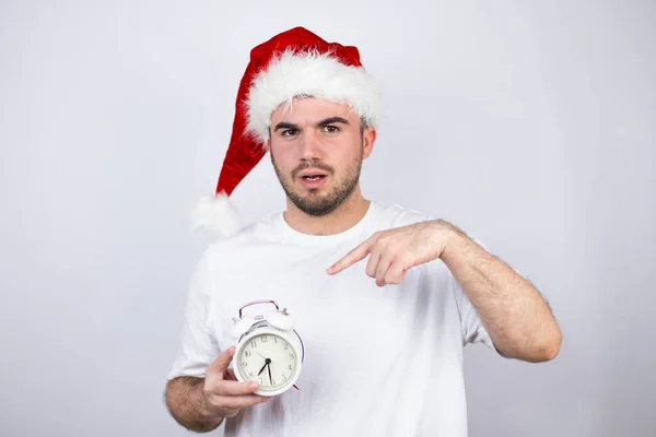 Young Handsome Man Wearing Santa Hat White Background Pointing Scared — Stock Photo, Image