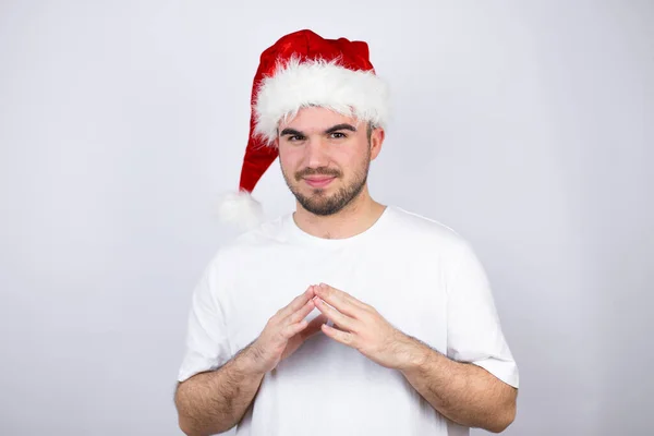 Jonge Knappe Man Draagt Een Kerstmuts Witte Achtergrond Met Handen — Stockfoto