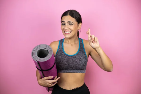 Jonge Mooie Vrouw Dragen Sportkleding Geïsoleerde Roze Achtergrond Gebaren Vinger — Stockfoto