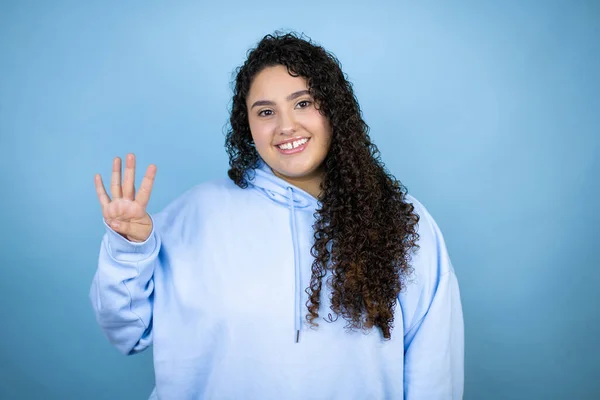 Jonge Mooie Vrouw Draagt Casual Sweatshirt Geïsoleerde Blauwe Achtergrond Tonen — Stockfoto