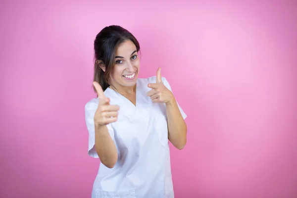 Young Brunette Doctor Girl Wearing Nurse Surgeon Uniform Isolated Pink — Stock Fotó