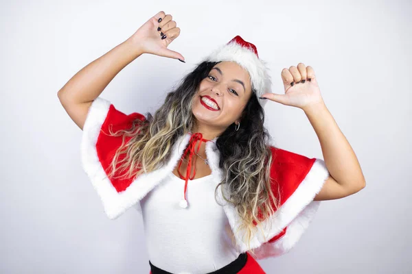 Young Beautiful Woman Wearing Santa Claus Costume White Background Looking — Φωτογραφία Αρχείου