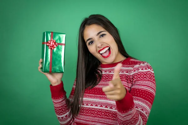 Young Beautiful Girl Holding Gift Isolated White Background Pointing You — Stock Photo, Image