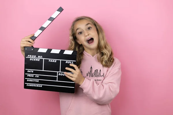 Young Beautiful Child Girl Standing Isolated Pink Background Holding Clapperboard — Stock Photo, Image