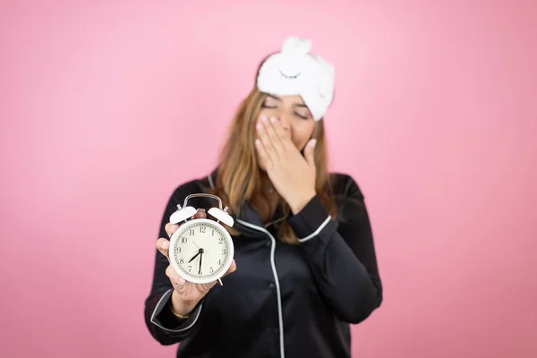 Young Caucasian Woman Wearing Sleep Mask Pajamas Isolated Pink Background — Stock Photo, Image