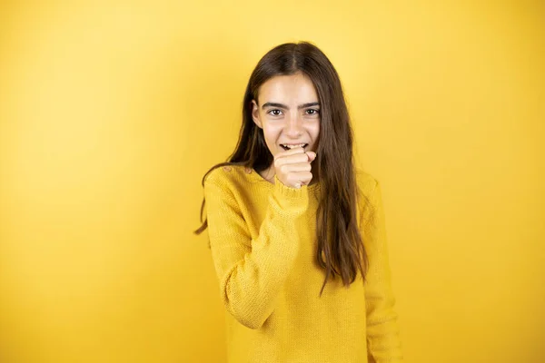 Pretty Girl Wearing Yellow Sweater Standing Isolated Yellow Background Her — Zdjęcie stockowe
