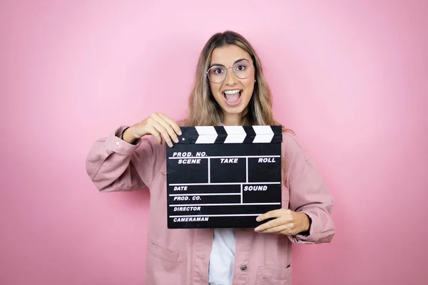 Young Beautiful Blonde Woman Long Hair Standing Pink Background Holding — Stock Photo, Image