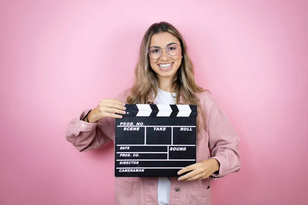 Young Beautiful Blonde Woman Long Hair Standing Pink Background Holding — Stock Photo, Image