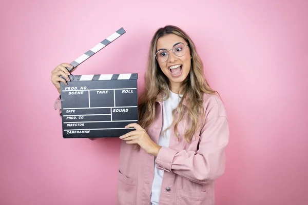 Young Beautiful Blonde Woman Long Hair Standing Pink Background Holding — Stock Photo, Image