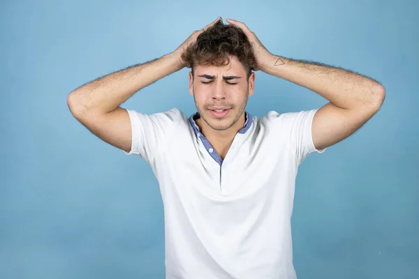 Young Handsome Man Wearing White Shirt Blue Background Suffering Headache — Stock Photo, Image