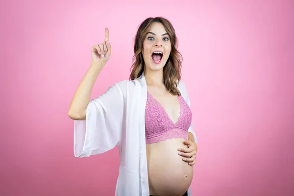 Young Beautiful Brunette Woman Pregnant Expecting Baby Isolated Pink Background — Stock Photo, Image