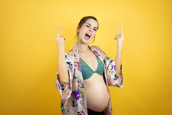 Young Beautiful Woman Pregnant Expecting Baby Wearing Pajama Isolated Yellow — ストック写真