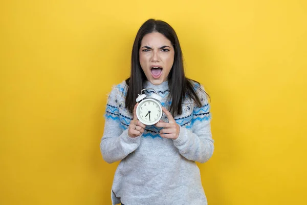 Young Caucasian Woman Wearing Casual Sweater Yellow Background Screaming Scared — Stock Photo, Image