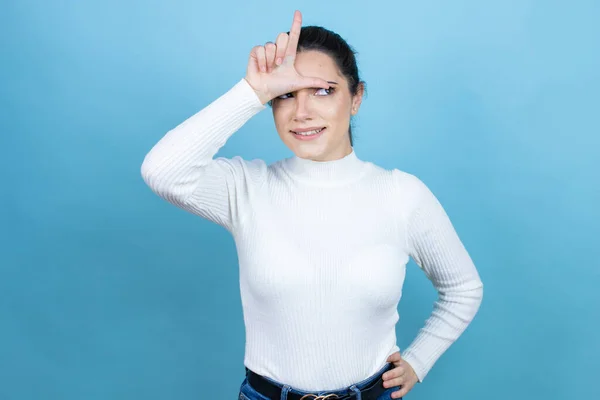 Jonge Kaukasische Vrouw Dragen Witte Trui Blauwe Achtergrond Lachen Van — Stockfoto