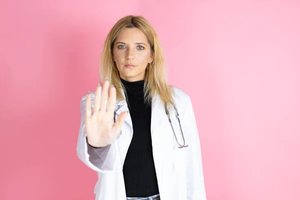Young Blonde Doctor Woman Wearing Stethoscope Standing Isolated Pink Background — Stock Fotó