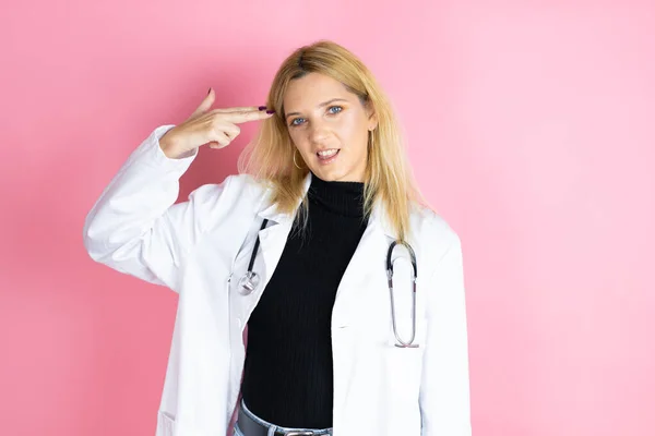 Young Blonde Doctor Woman Wearing Stethoscope Standing Isolated Pink Background — Stock Fotó