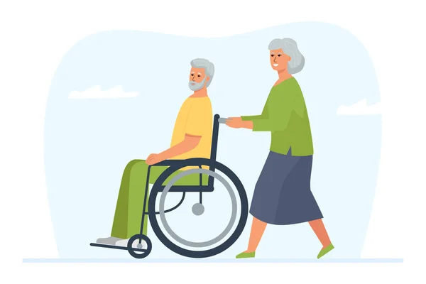 Yaşlı bir kadın engelli kocasını tekerlekli sandalyeye oturtuyor. Bir yürüyüş ve olgun evli bir çiftin eğlencesi..