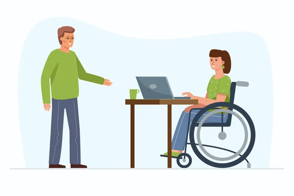 Tekerlekli sandalyedeki engelli bir kadın laptopun arkasındaki ofiste çalışıyor. Meslektaşımla iletişim ve etkileşim.