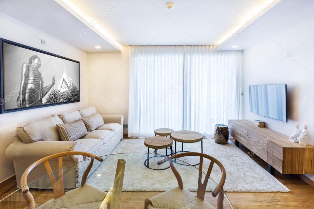 Living room with TV and big window