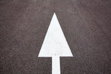 Arrow sign on the road clipart