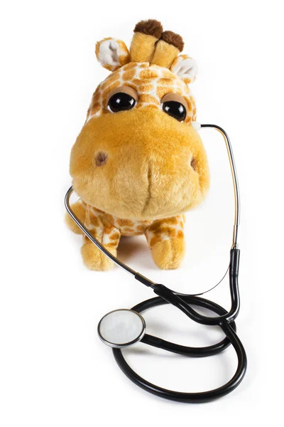 Stetoskop ile gülümseyen peluş oyuncak zürafa
