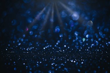 Soyut mavi Noel arkaplanı. Parlak odaklı ışıklar, bokeh.