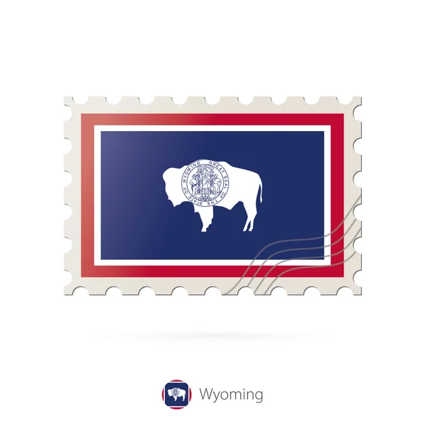 Sello postal con la imagen de la bandera del estado de Wyoming . — Vector de stock