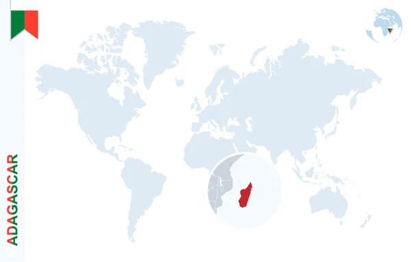 Mapa do mundo azul com ampliação em Madagáscar . — Vetor de Stock