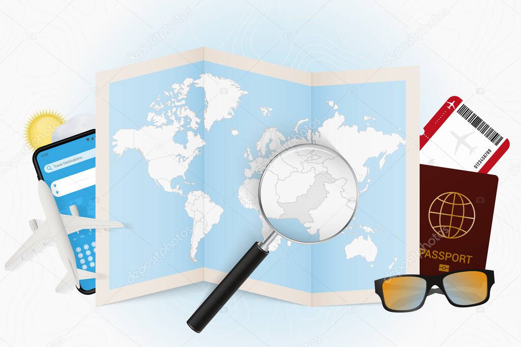 Travel destination Pakistan, tourism mockup with travel equipment and world map with magnifying glass on a Pakistan.