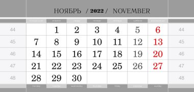 2022 Kasım 2022 tarihli üç aylık takvim bloğu. Duvar takvimi, İngilizce ve Rusça. Hafta pazartesiden itibaren başlıyor.