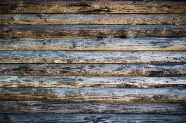 Houten logboeken muur van vakantiehuis achtergrond — Stockfoto