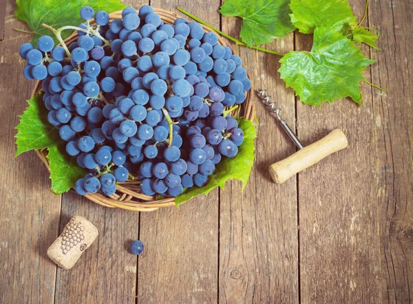 Grapes on a wooden table Royalty Free Stock Images