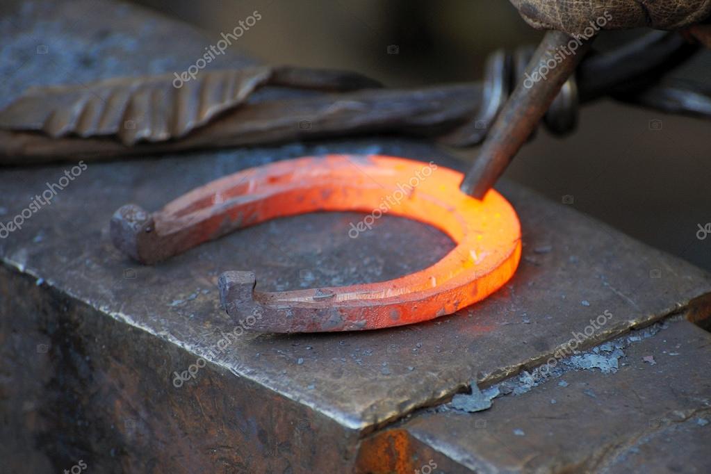 Blacksmith a horseshoe — Stock Photo © bpm82 106876928