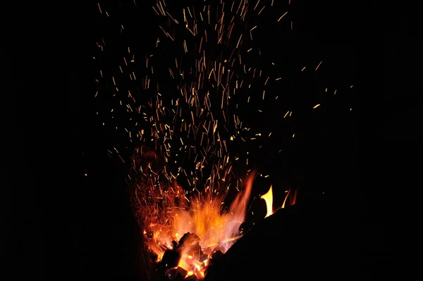 Sparks from the fire in the forge — Stock Photo, Image