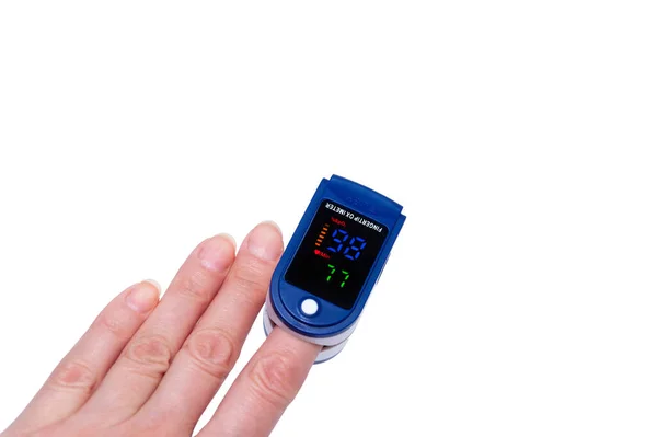 Pulse Oximeter Used Measure Pulse Rate Oxygen Levels Close Finger — Stock Photo, Image