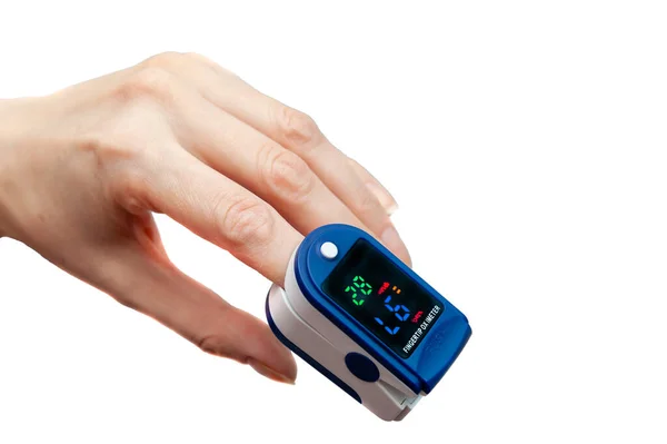 Pulse Oximeter Used Measure Pulse Rate Oxygen Levels Close Finger — Stock Photo, Image