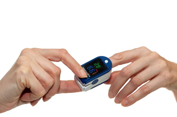 Pulse Oximeter Used Measure Pulse Rate Oxygen Levels Close Finger — Stock Photo, Image