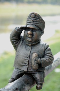 UZHGOROD, UKRAINE - august 05: Small bronze statue of Good Soldi clipart